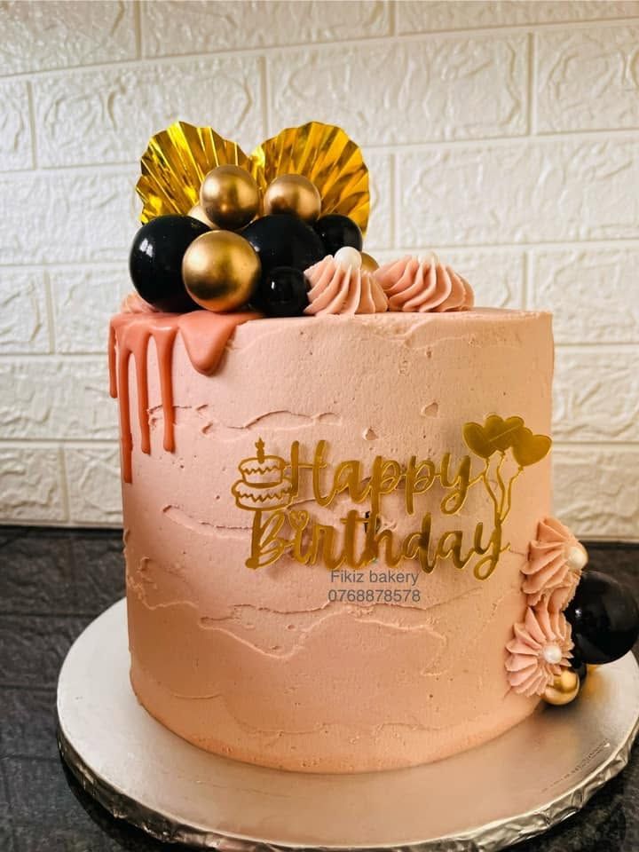 Peach Drip, Black & Gold Balloons — a custom bake by Fikiz Bakery
