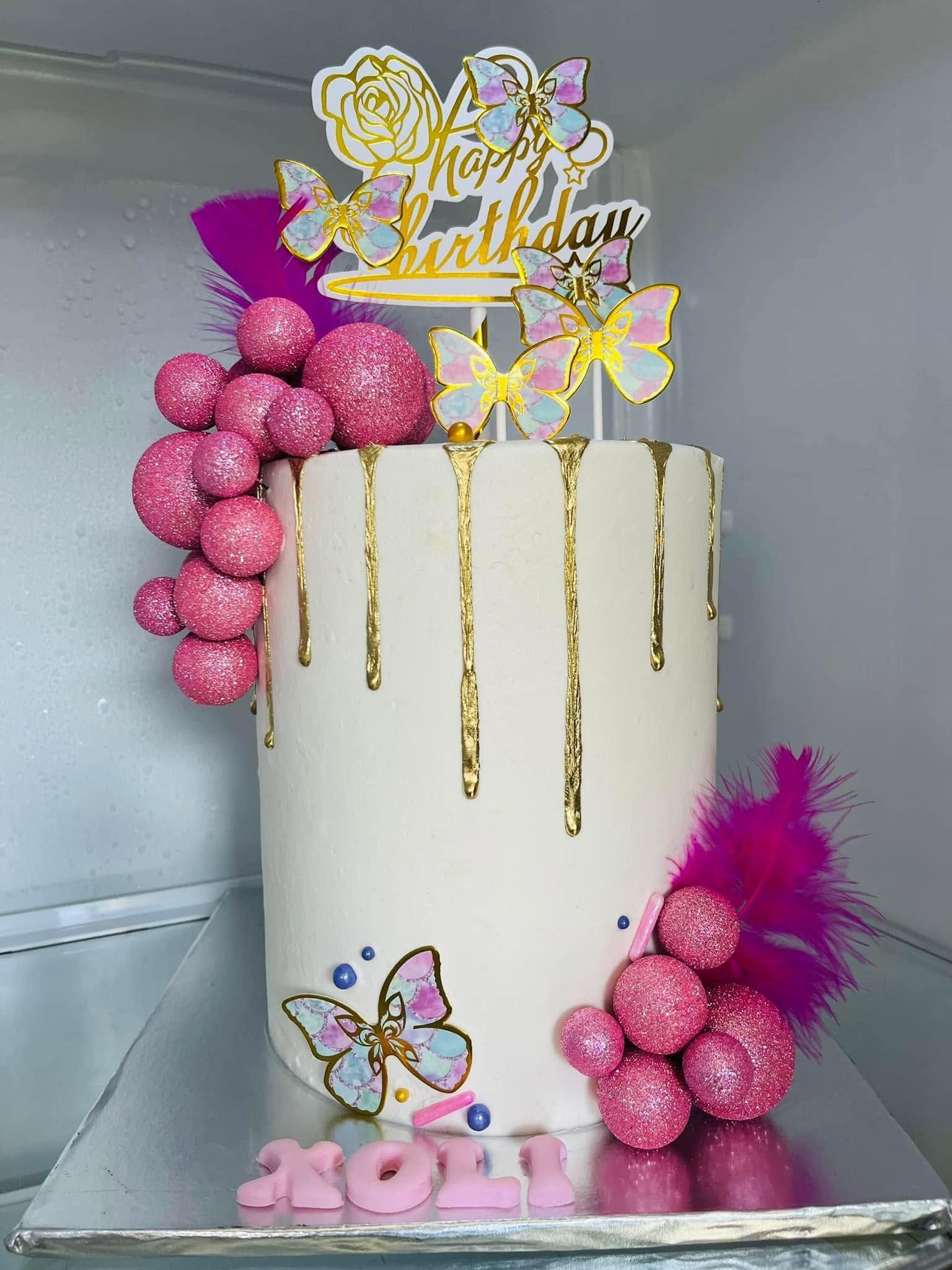 Ivory & Gold Drip with Pink Spheres — a custom bake by Fikiz Bakery